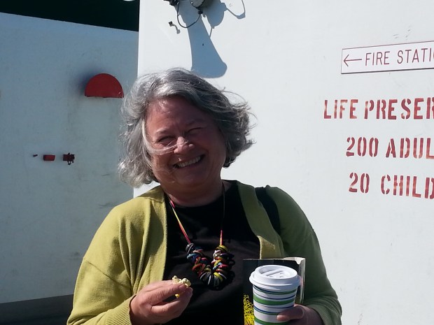 Mom on ferry with popcorn.