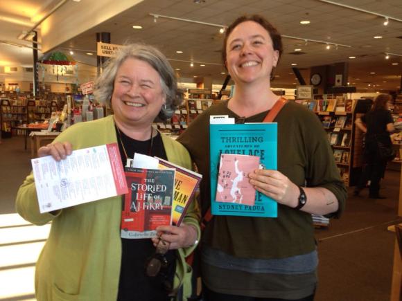 Third Place Books after spinning their wheel—my mom got a free book and I got a 20% off next purchase coupon.